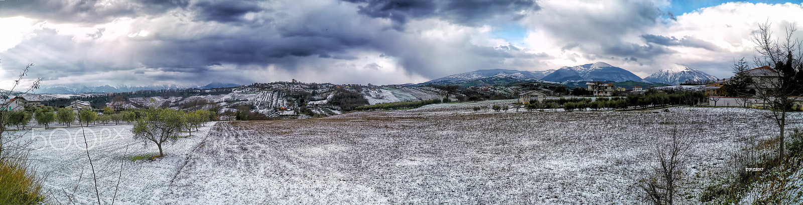 Panasonic DMC-FX100 sample photo. Snow clouds photography