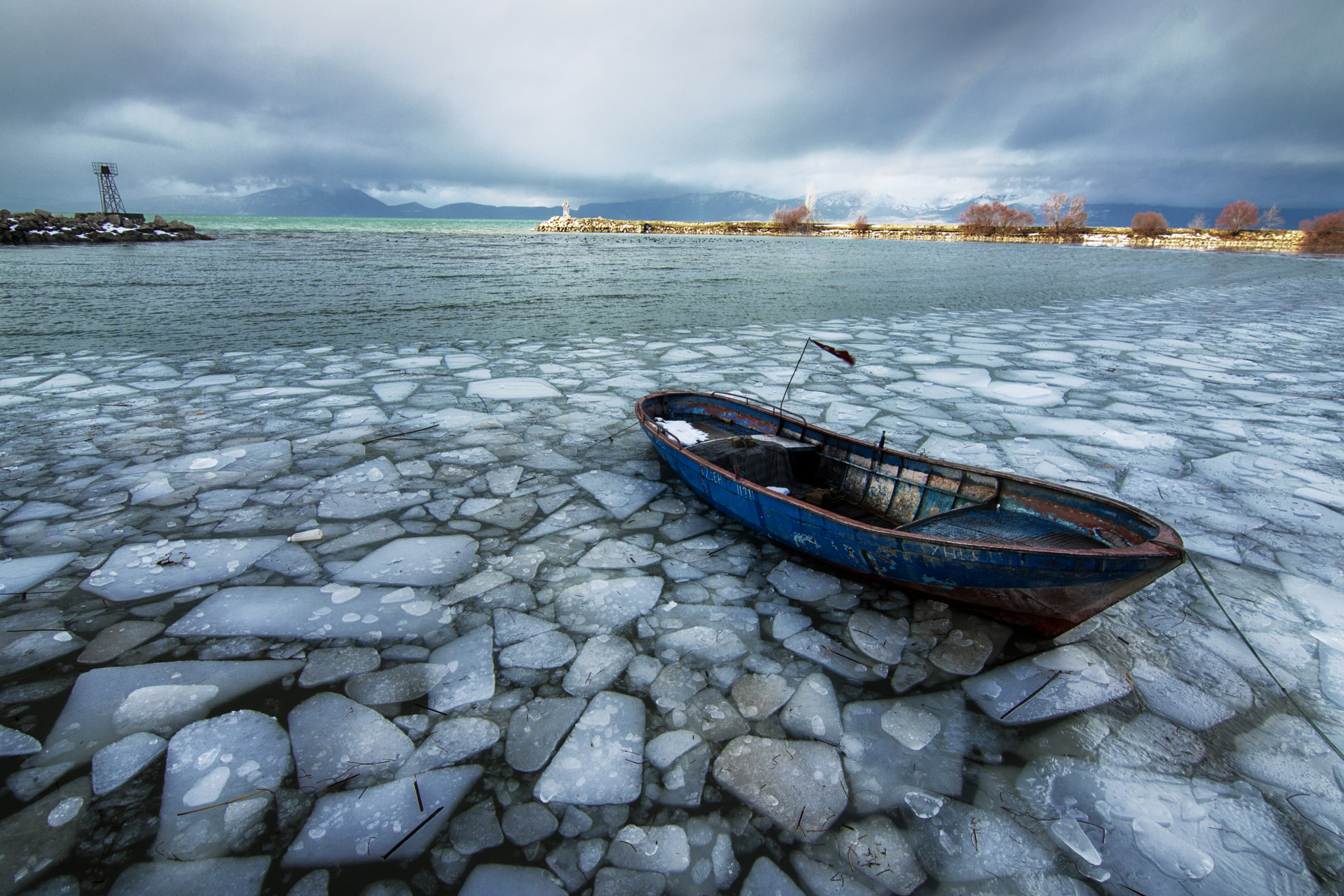 Canon EOS 760D (EOS Rebel T6s / EOS 8000D) sample photo. Boat, ice and rainbow photography