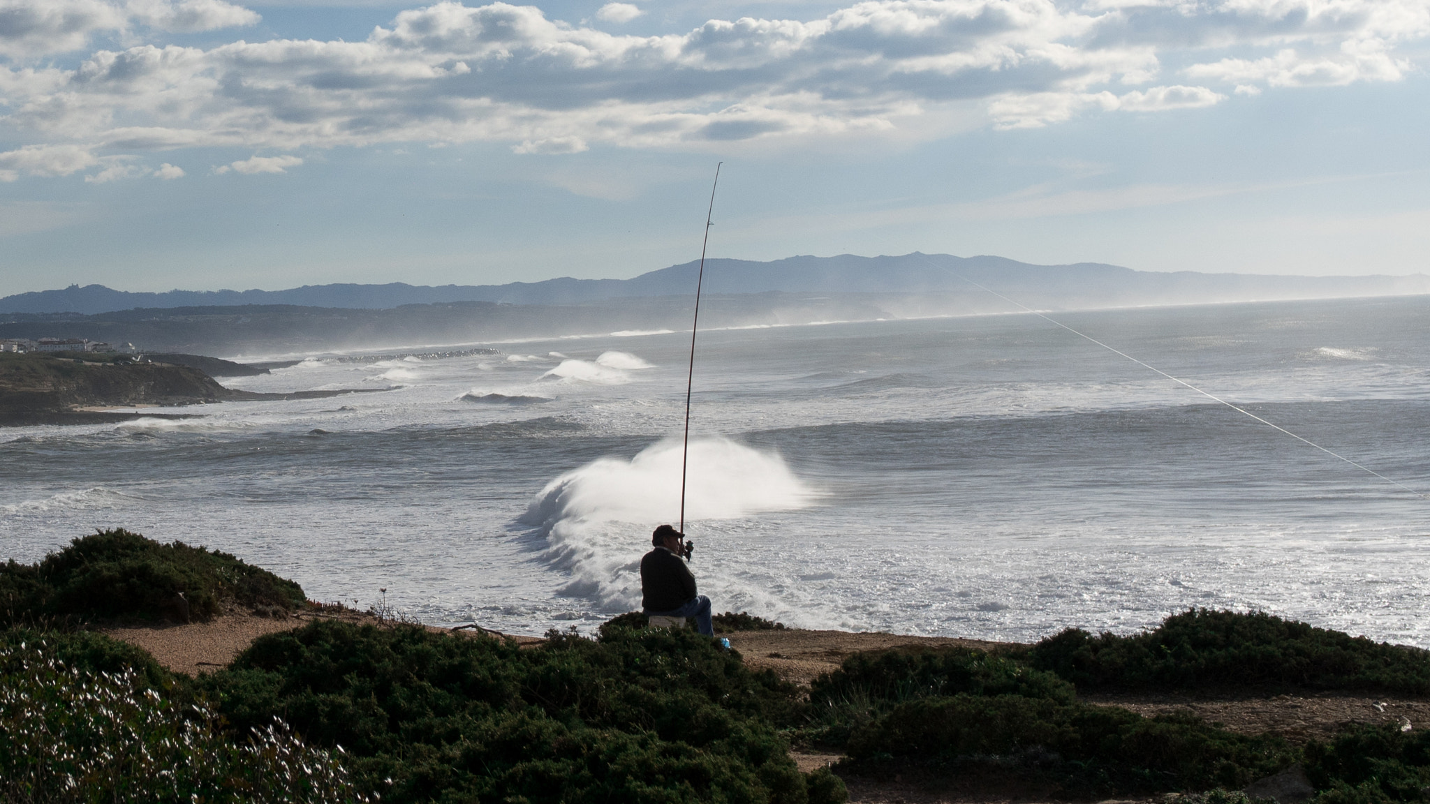 Panasonic Lumix DMC-GH4 + .7x Metabones 18-35/1.8 sample photo. Fisherman on the cliff photography