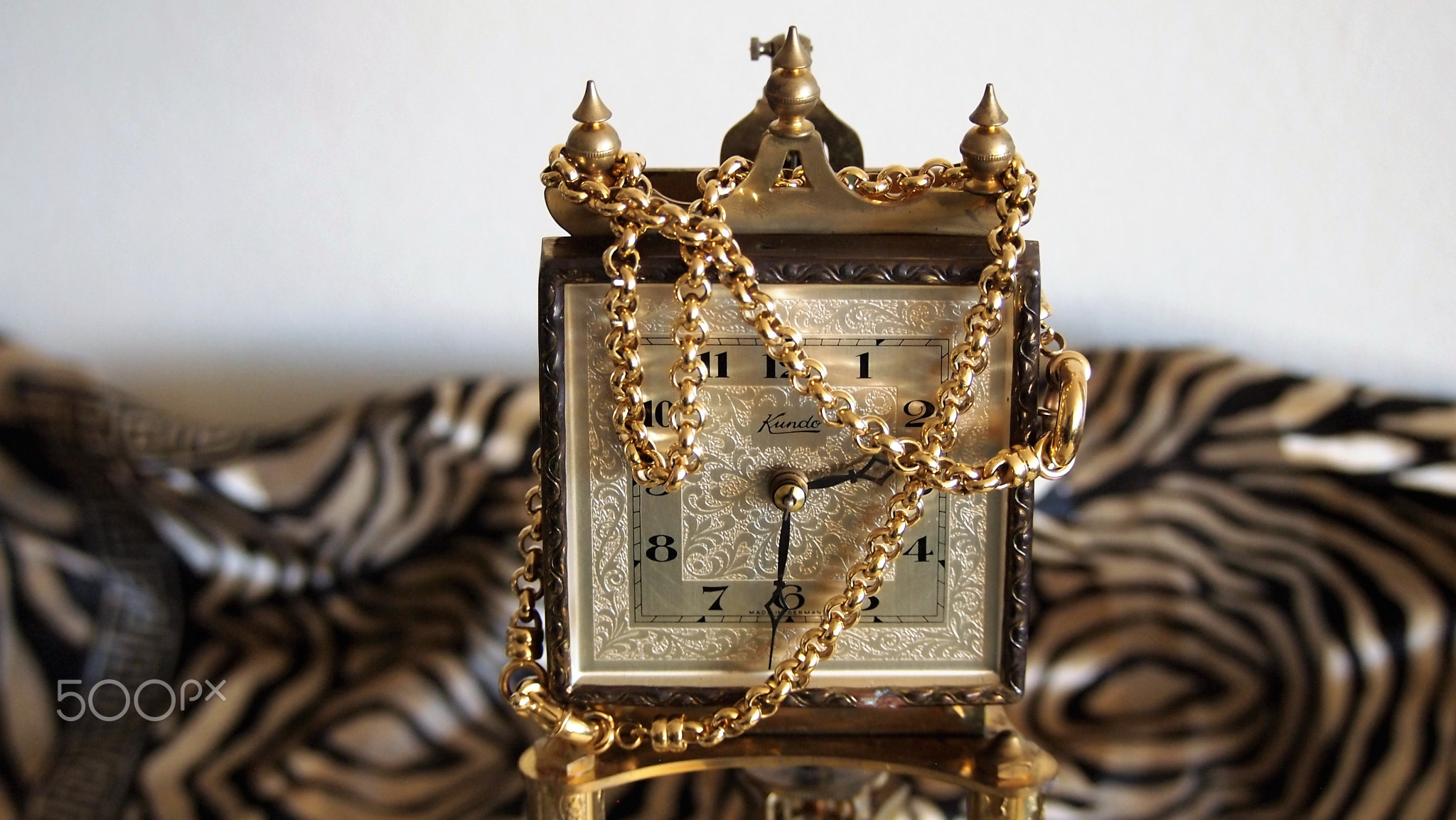 Antique clock and gold chain