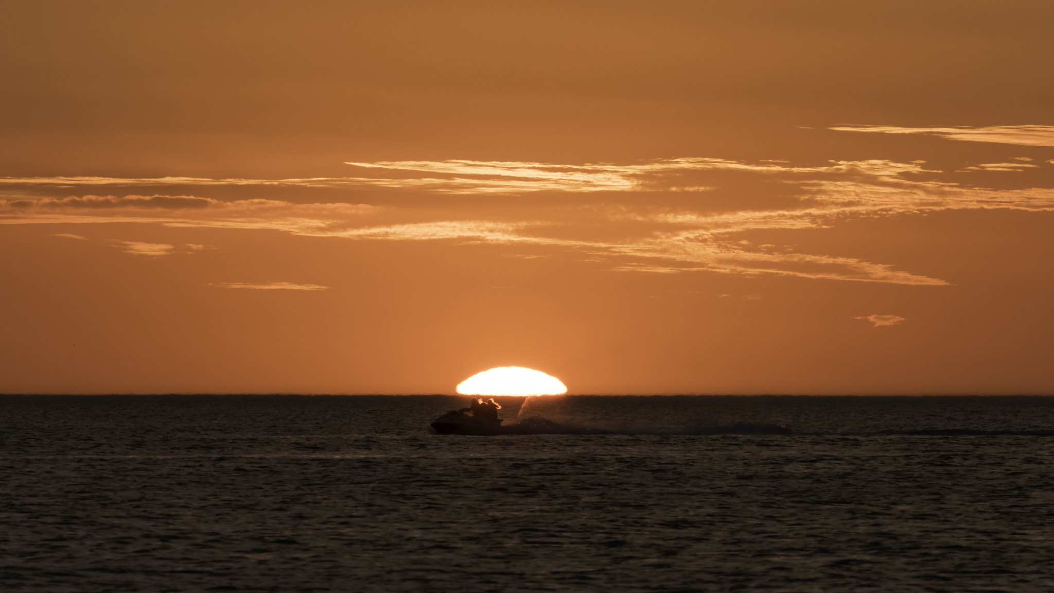 Canon EF-S 55-250mm F4-5.6 IS II sample photo. Jetski in the sunset photography