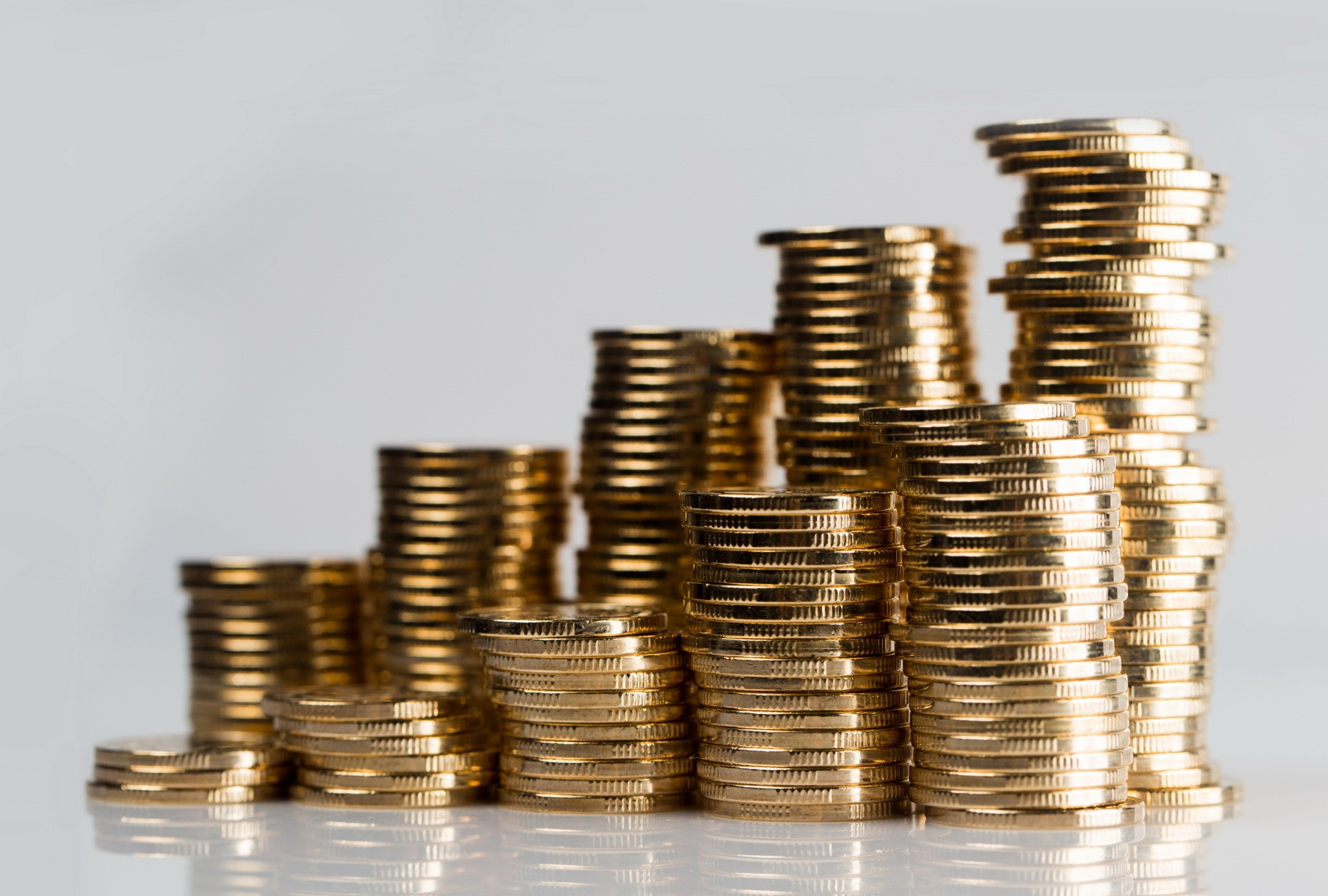 many coins on a white background