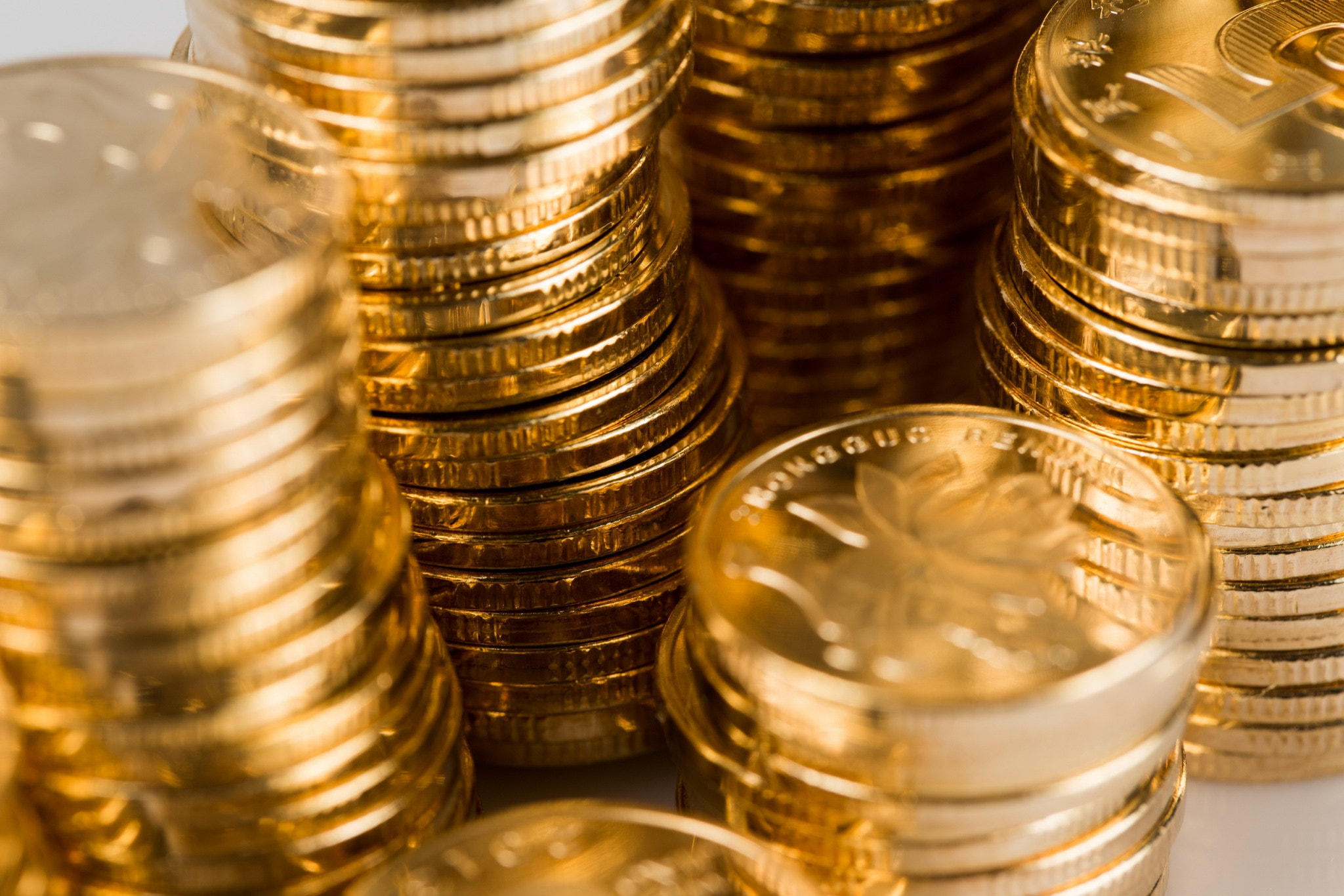 many coins on a white background