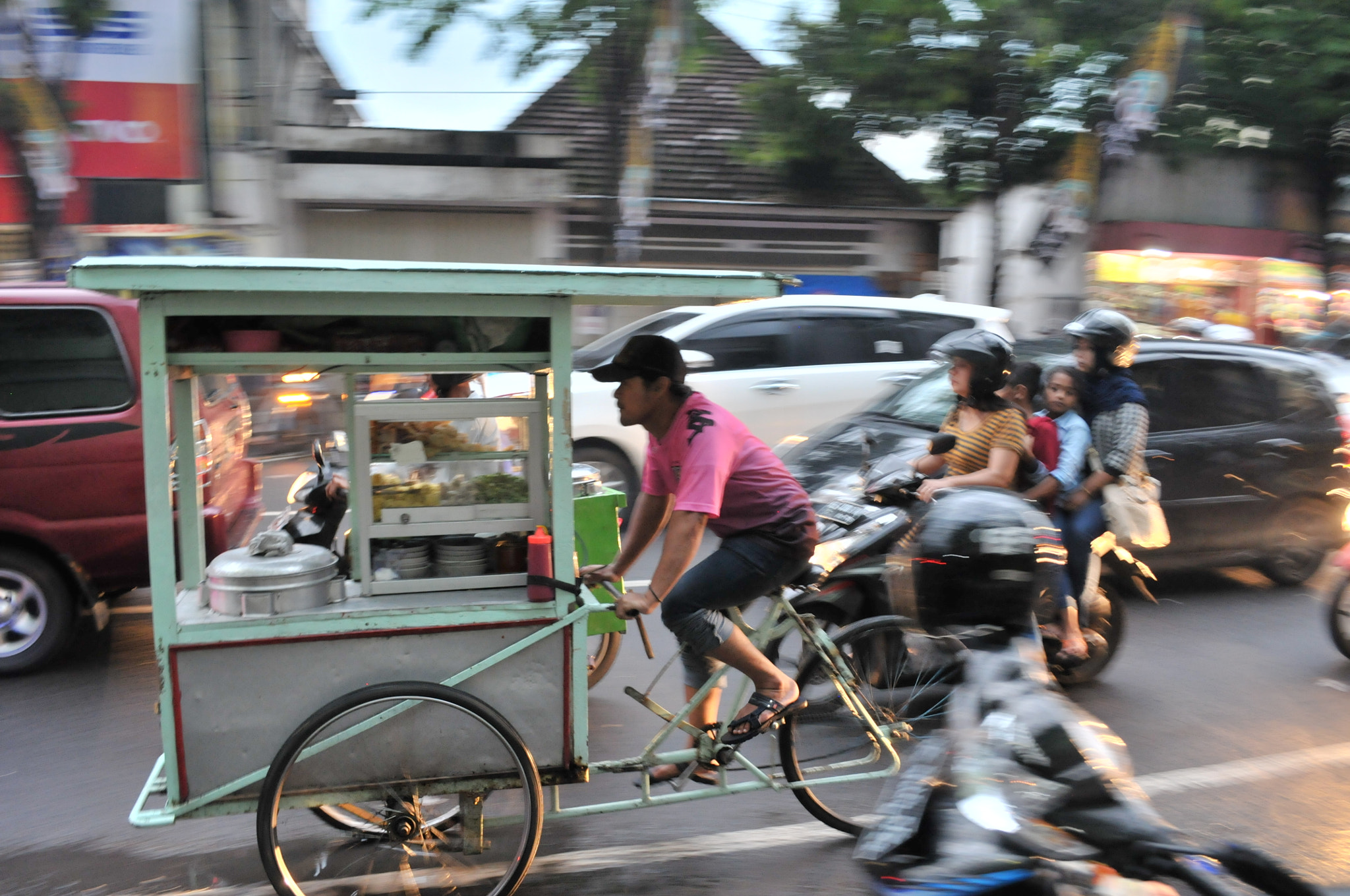 Nikon D300S sample photo. Street vendor going around photography