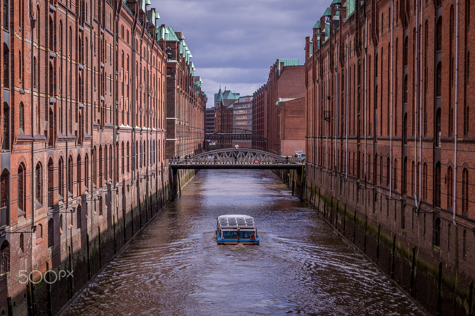 Sony SLT-A37 sample photo. Famous speicherstadt warehouse district with dark clouds in hamburg, germany photography