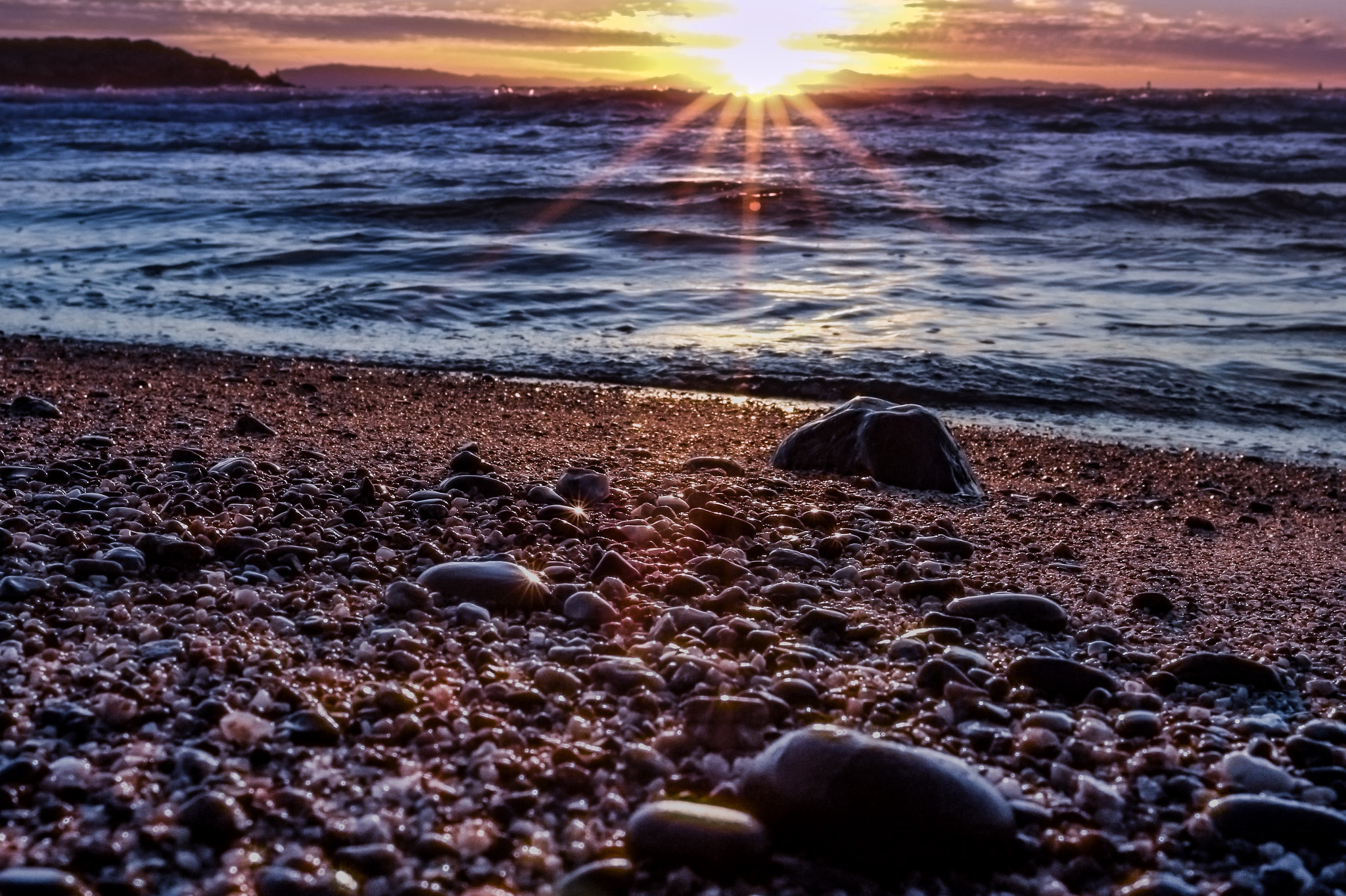 Canon EF 16-35mm F2.8L II USM sample photo. Sun rays off rocks photography