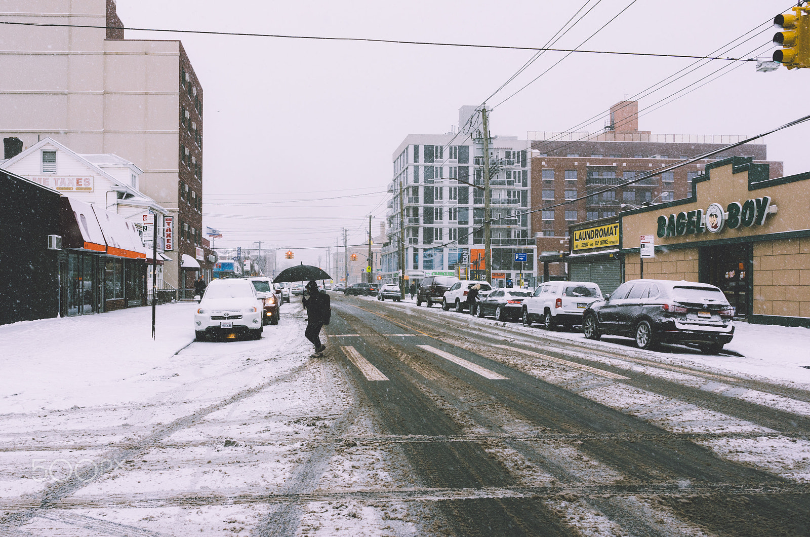 Sony a7R + Sony FE 28mm F2 sample photo. Snow and umbrella, why? photography