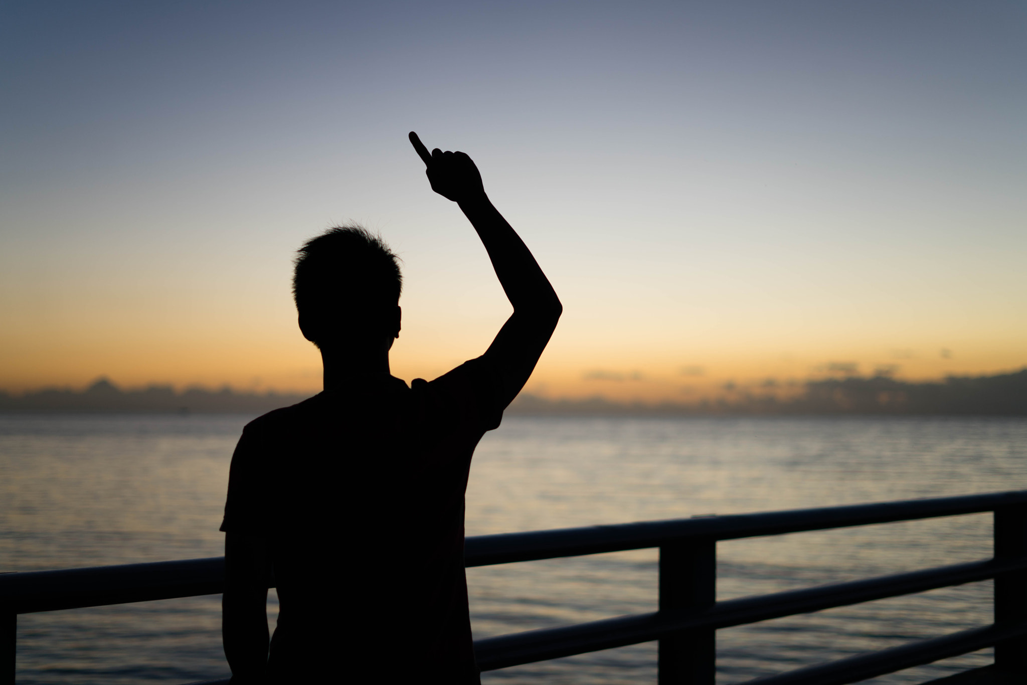 Sony a7R II + Sony FE 50mm F1.8 sample photo. Boy watching sun rise. photography