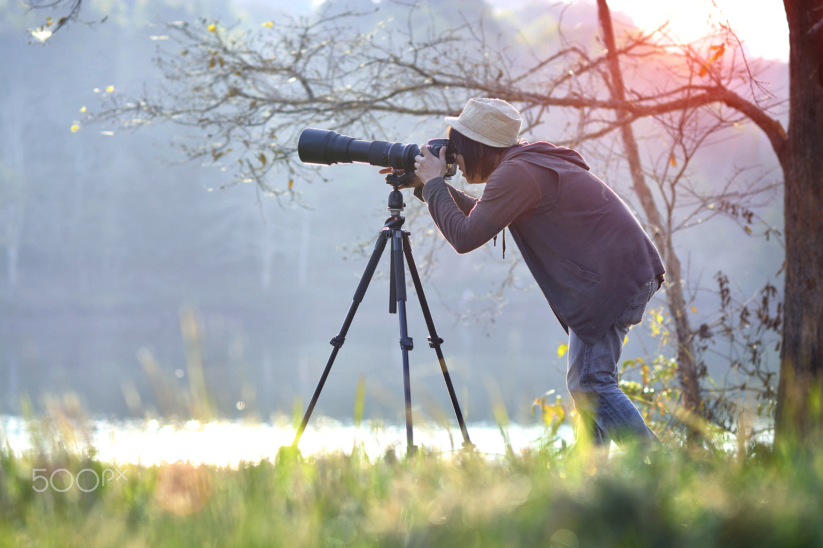 Nikon D7100 sample photo. Photographer in action with telephoto lens at morning light photography