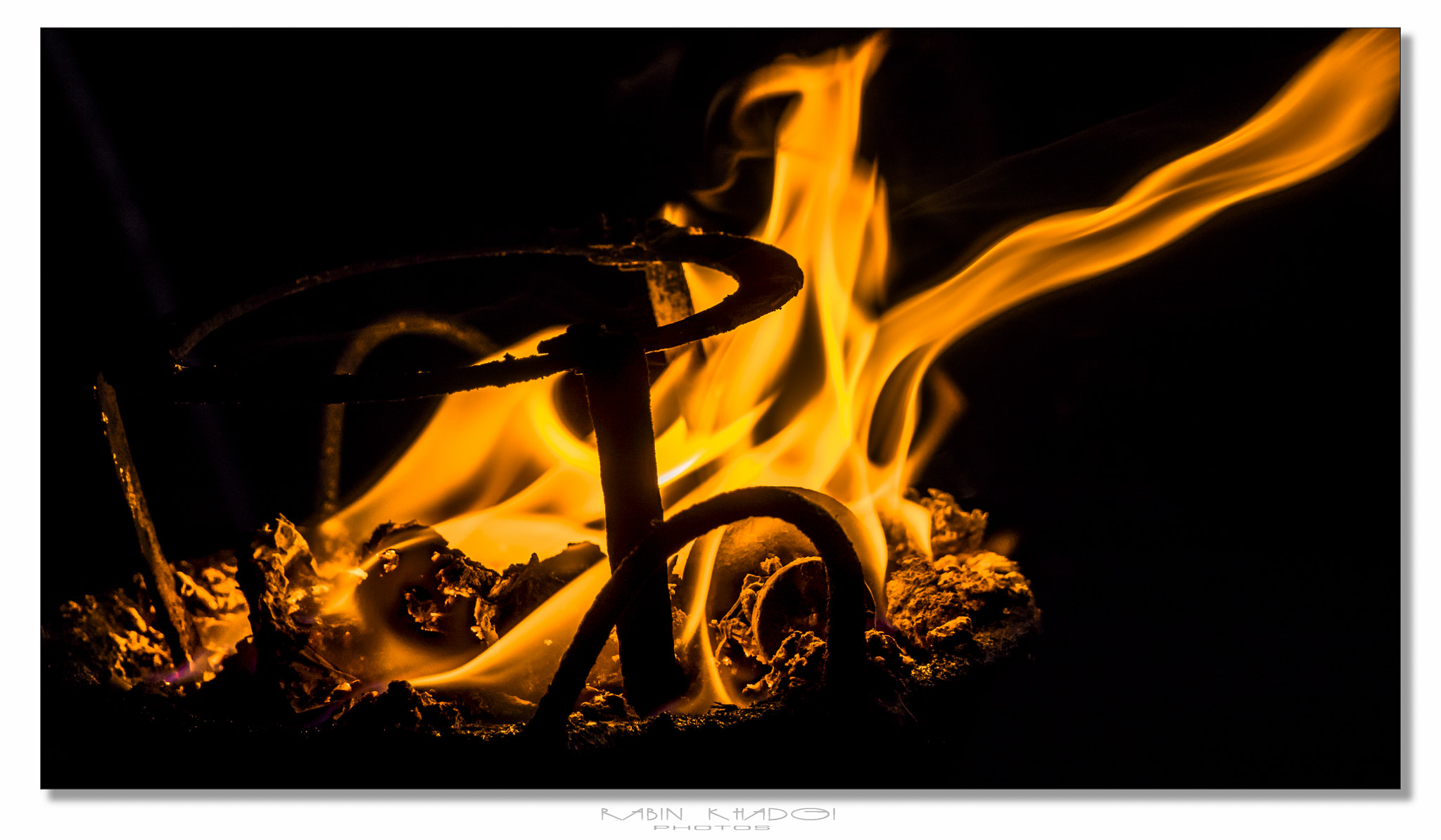 LUMIX G VARIO 12-60/F3.5-5.6 sample photo. Fire flame at temple in kathmandu, nepal photography