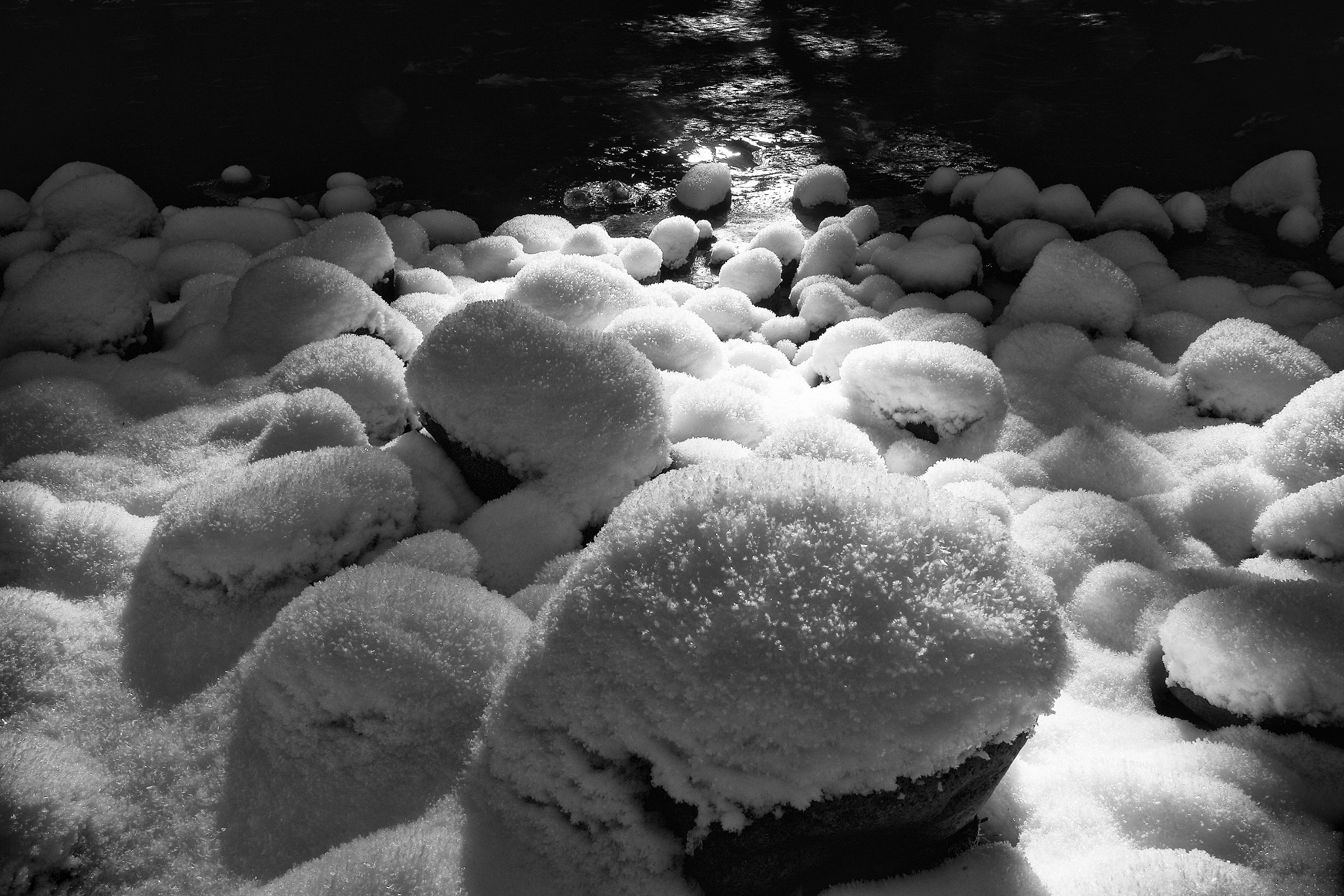 Canon EOS-1D Mark IV + Canon EF 17-40mm F4L USM sample photo. Snow covered boulders photography