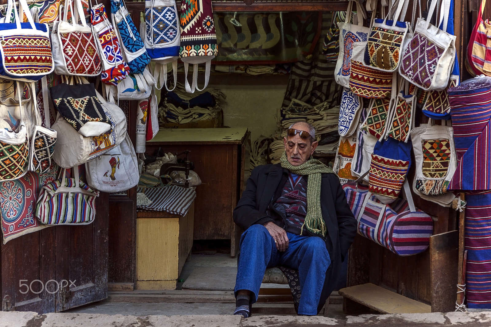 Nikon D5500 + Sigma 18-250mm F3.5-6.3 DC OS HSM sample photo. Old man waiting for clients at old cairo photography