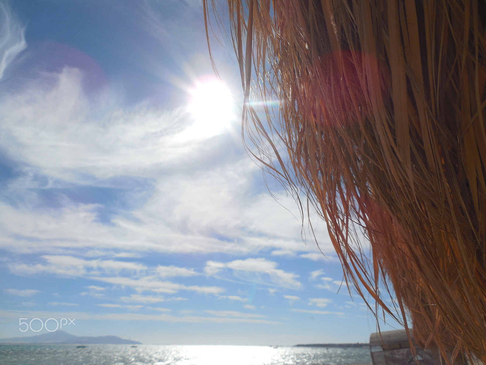 Nikon COOLPIX L620 sample photo. Clouds on the beach photography