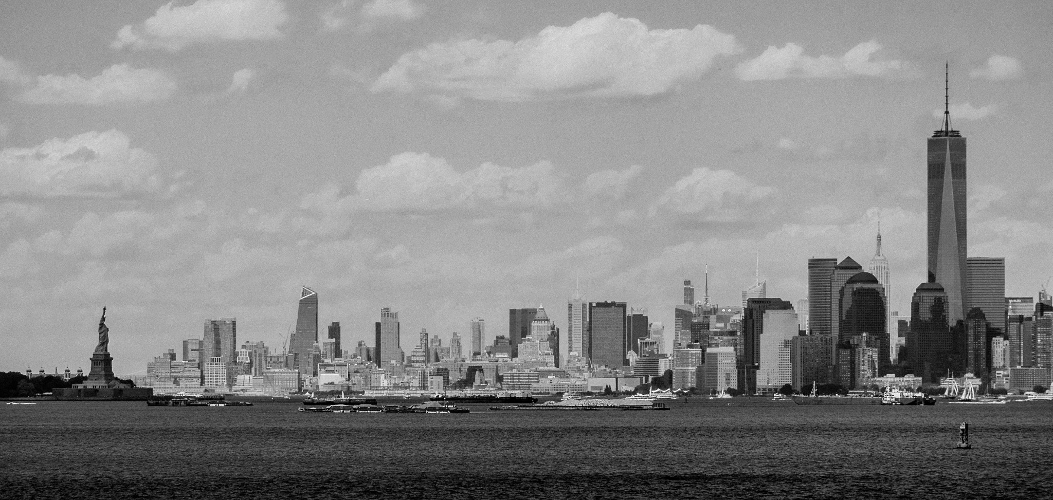 Fujifilm X-M1 + Fujifilm XC 50-230mm F4.5-6.7 OIS sample photo. Classical nyc skyline view from a boat photography