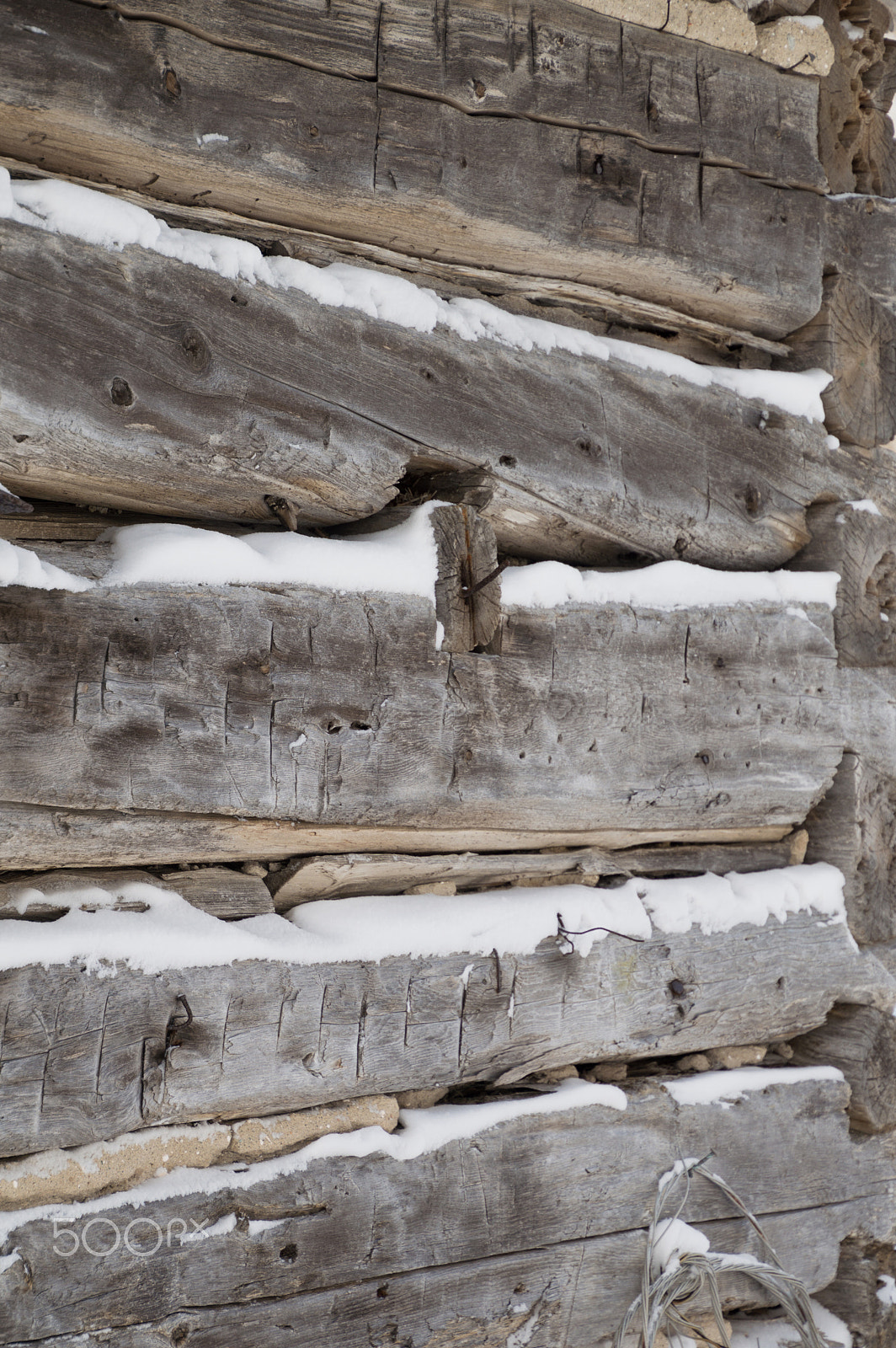 Nikon D3200 sample photo. Log cabin sawn logs to corner closeup with snow in between photography
