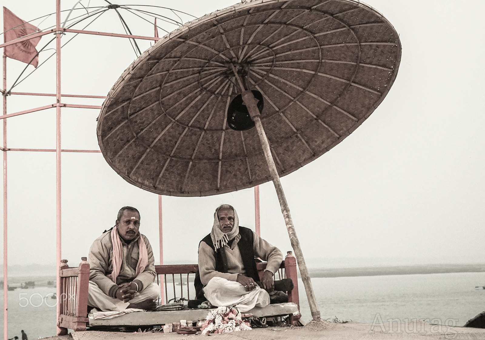 Sony a6000 + Sony FE 28-70mm F3.5-5.6 OSS sample photo. The priest and his umbrella photography
