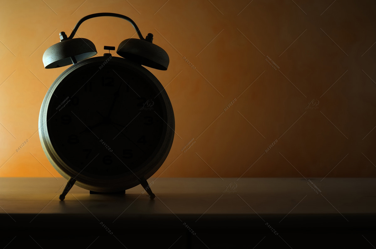 Tamron SP 24-70mm F2.8 Di VC USD sample photo. Bedside alarm clock in backlit photography