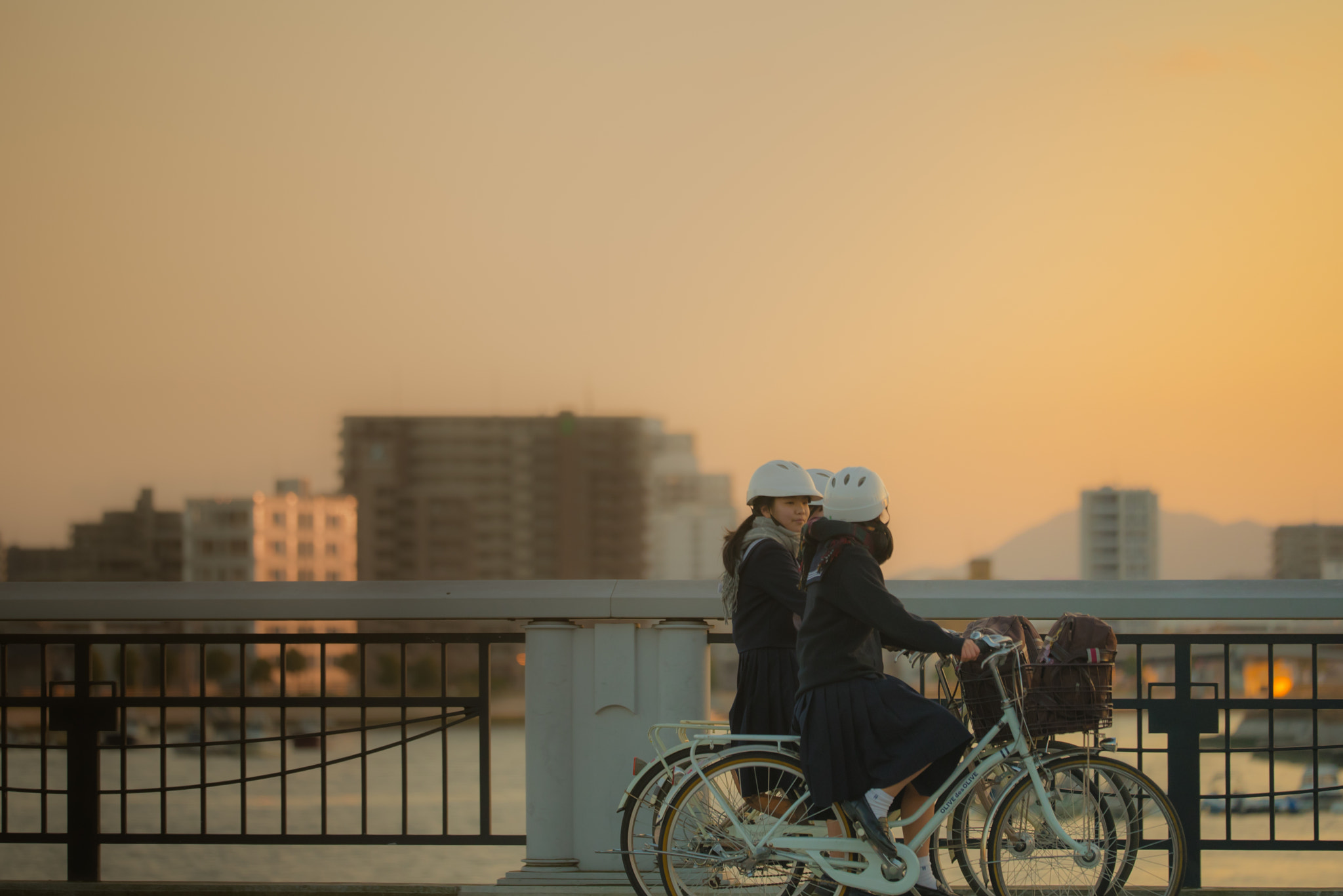Sigma 150mm F2.8 EX DG OS Macro HSM sample photo. Bicycle girls photography