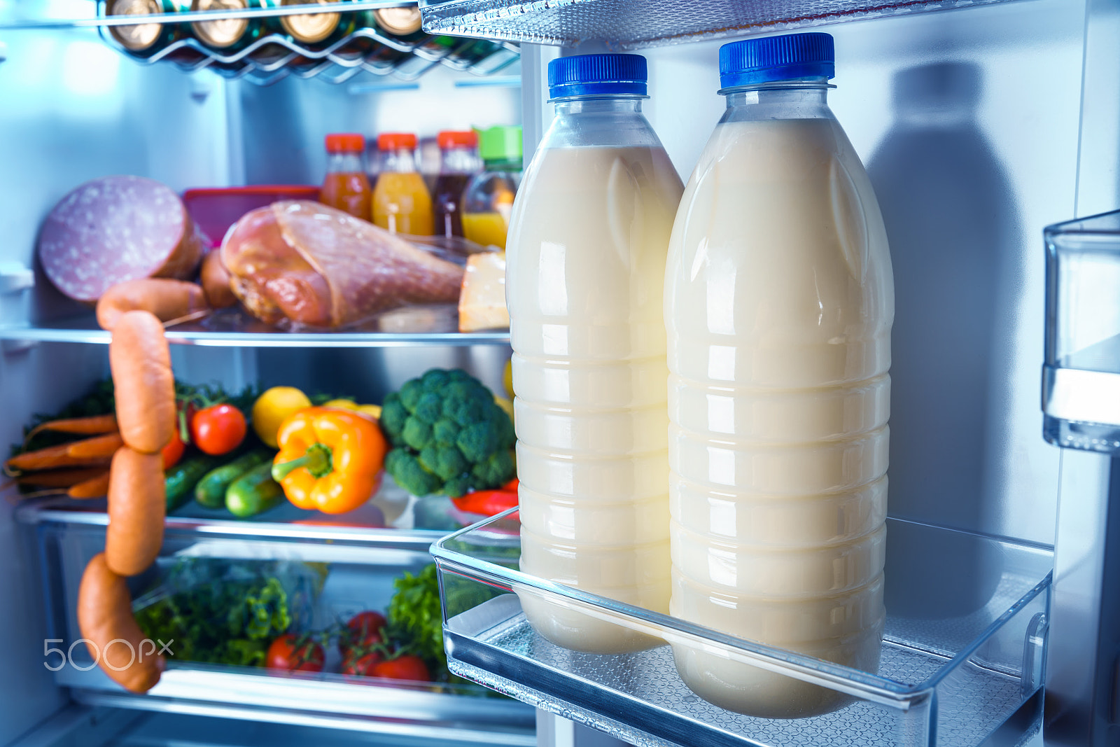Canon EF 24-70mm F2.8L II USM sample photo. Open refrigerator filled with food photography