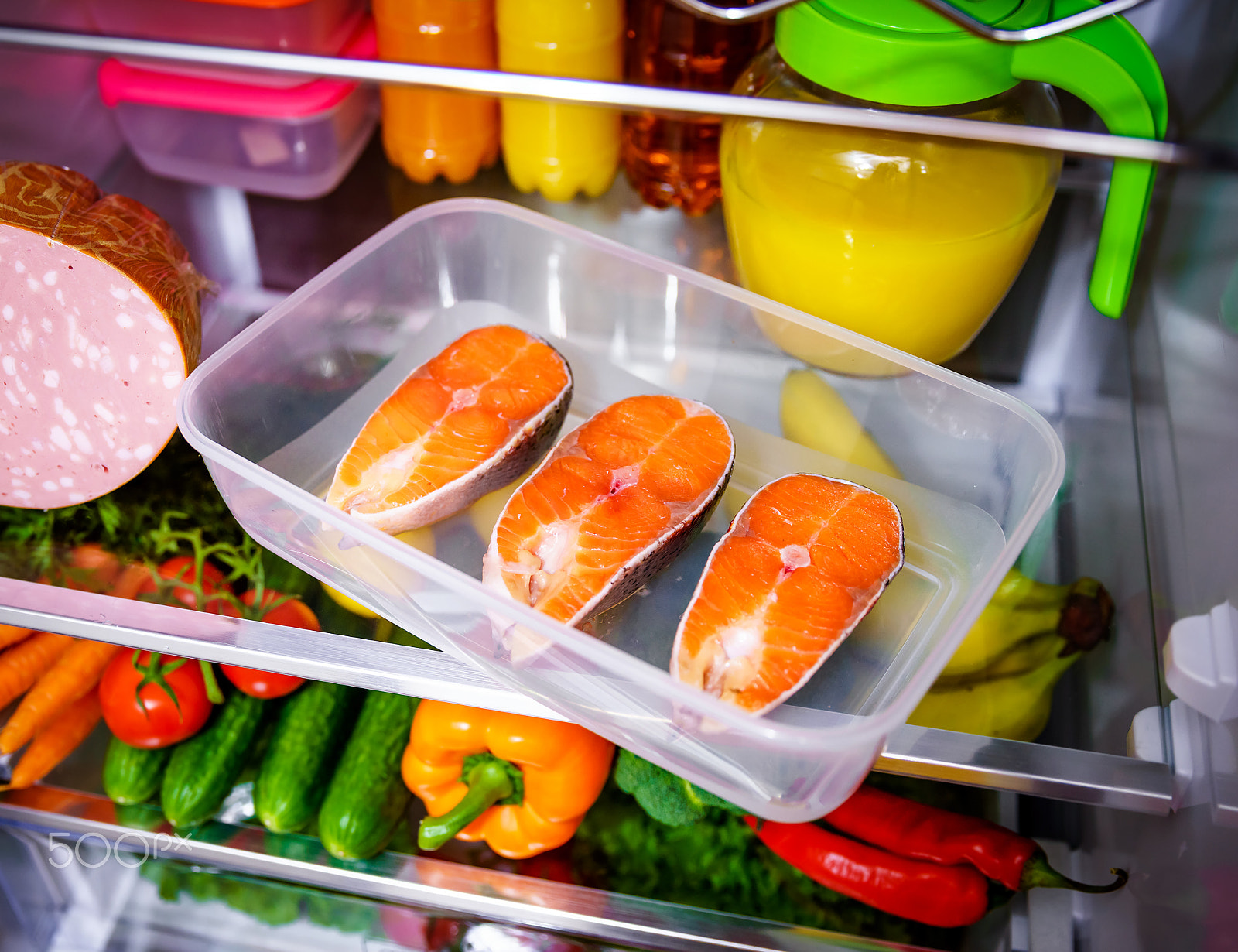 Canon EF 24-70mm F2.8L II USM sample photo. Raw salmon steak in the open refrigerator photography