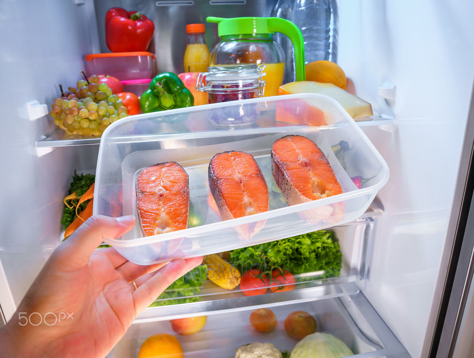 Canon EF 24-70mm F2.8L II USM sample photo. Raw salmon steak in the open refrigerator photography