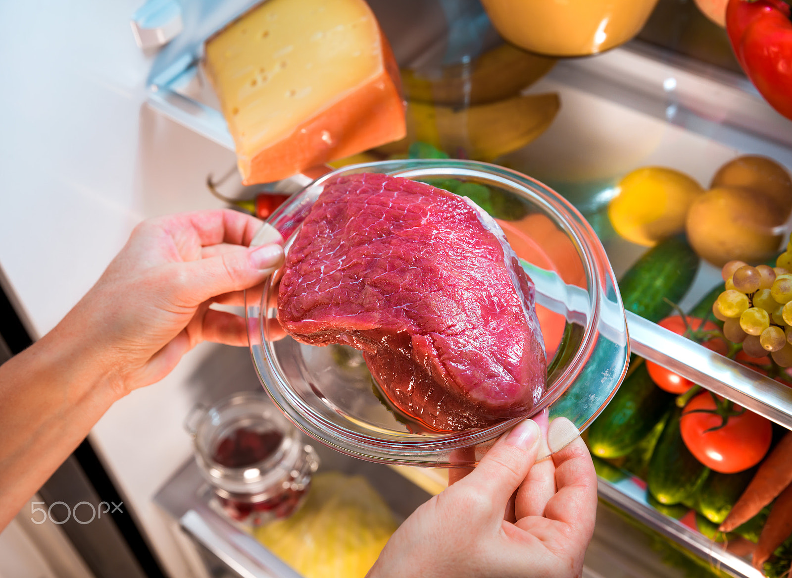 Canon EF 24-70mm F2.8L II USM sample photo. Fresh raw meat on a shelf open refrigerator photography