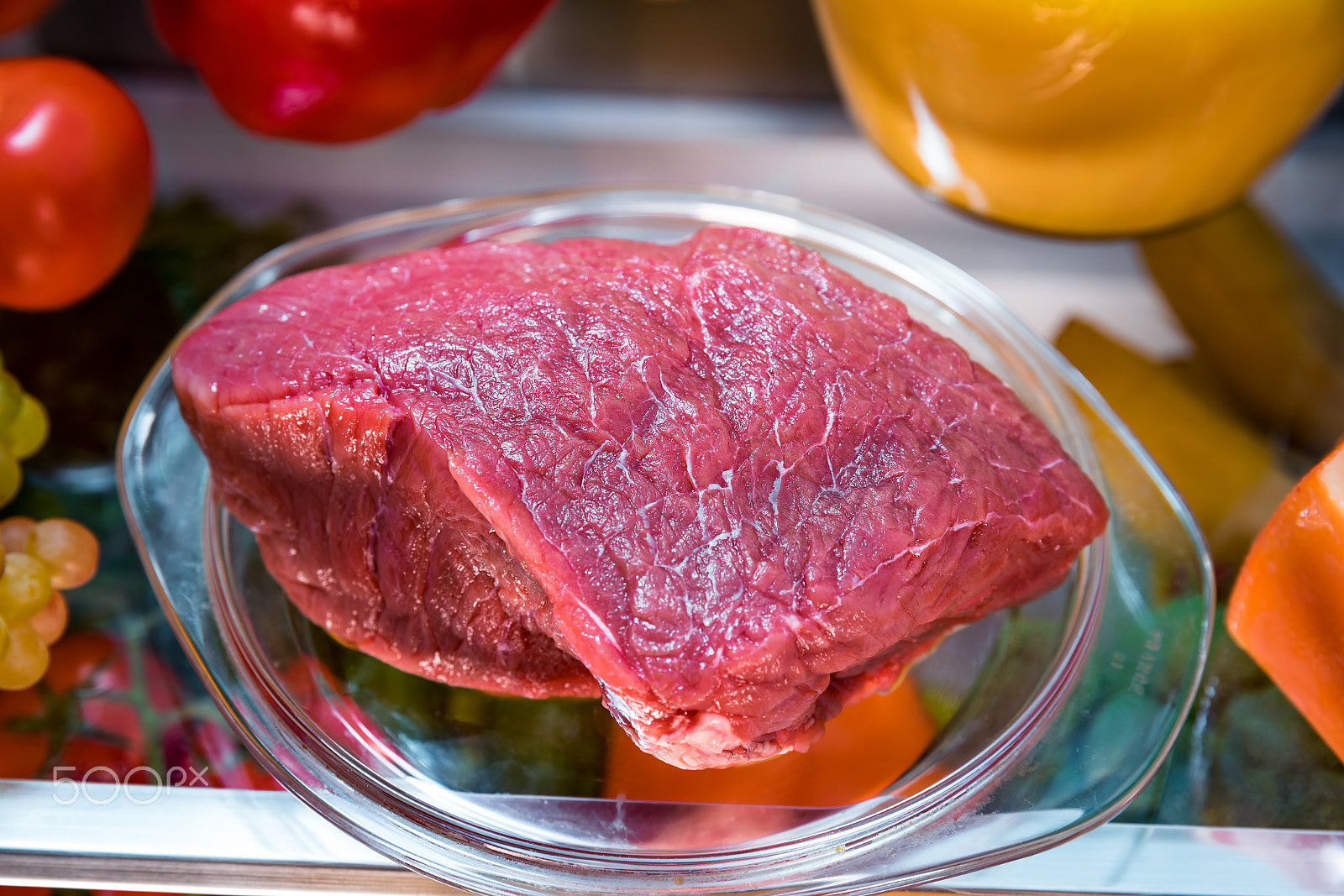 Canon EF 24-70mm F2.8L II USM sample photo. Fresh raw meat on a shelf open refrigerator photography