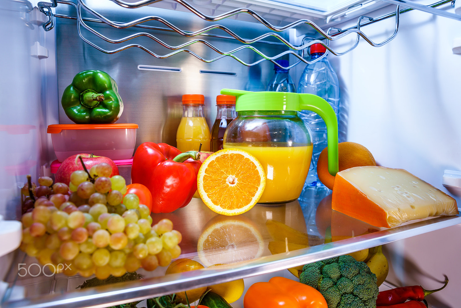 Canon EF 24-70mm F2.8L II USM sample photo. Open refrigerator filled with food photography