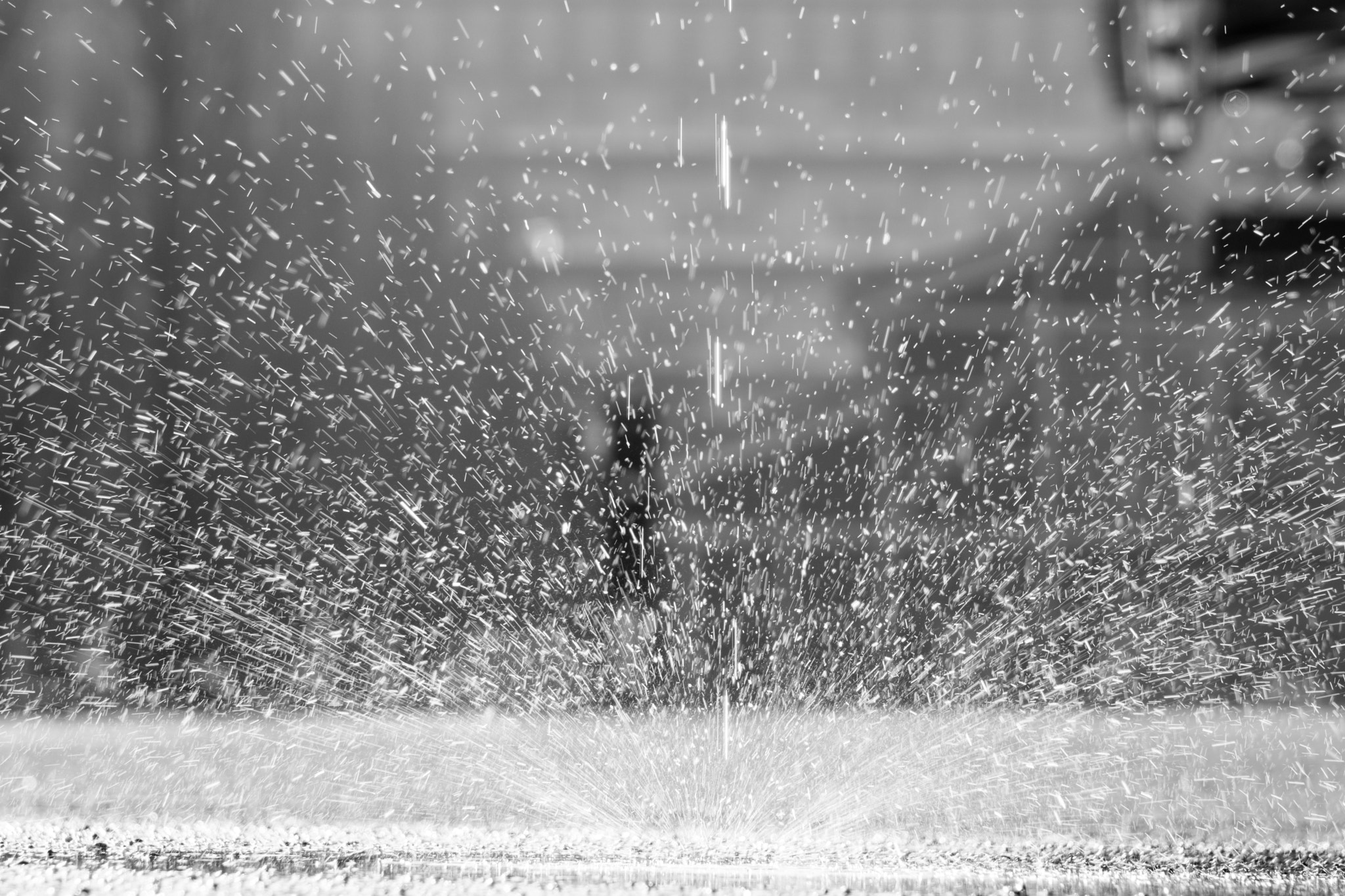 Sony a6300 + Sony E 55-210mm F4.5-6.3 OSS sample photo. Water dropping on concrete floor photography