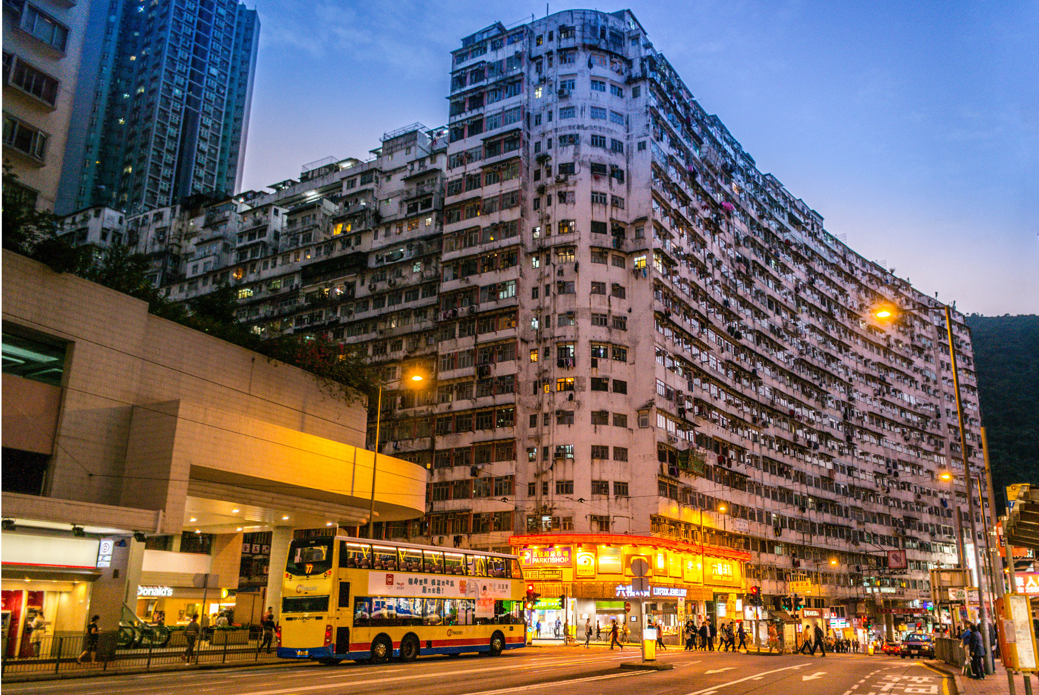 Samsung NX1000 + Samsung NX 16mm F2.4 Pancake sample photo. Outside the monster buildings photography