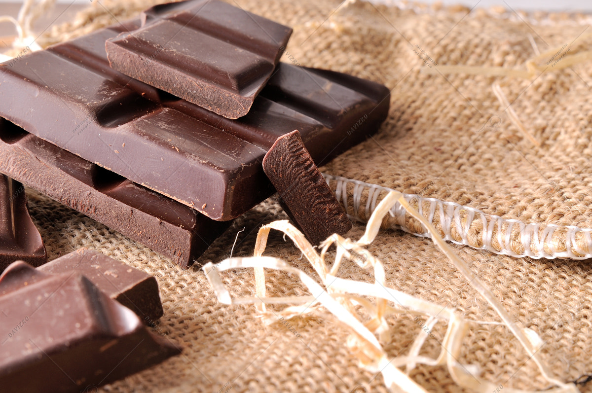 Tamron SP 24-70mm F2.8 Di VC USD sample photo. Heap of artisan portions chocolate on burlap front view photography