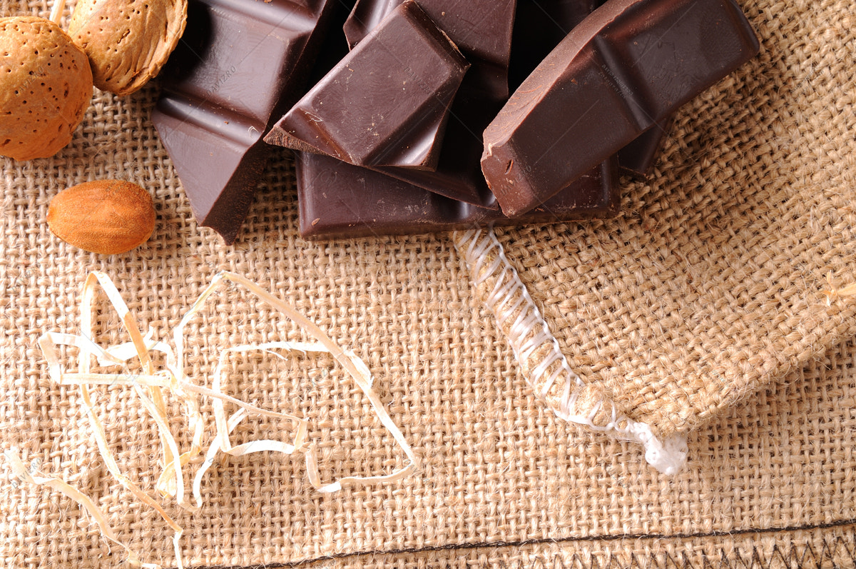 Tamron SP 24-70mm F2.8 Di VC USD sample photo. Heap of artisan portions chocolate with almond top view photography