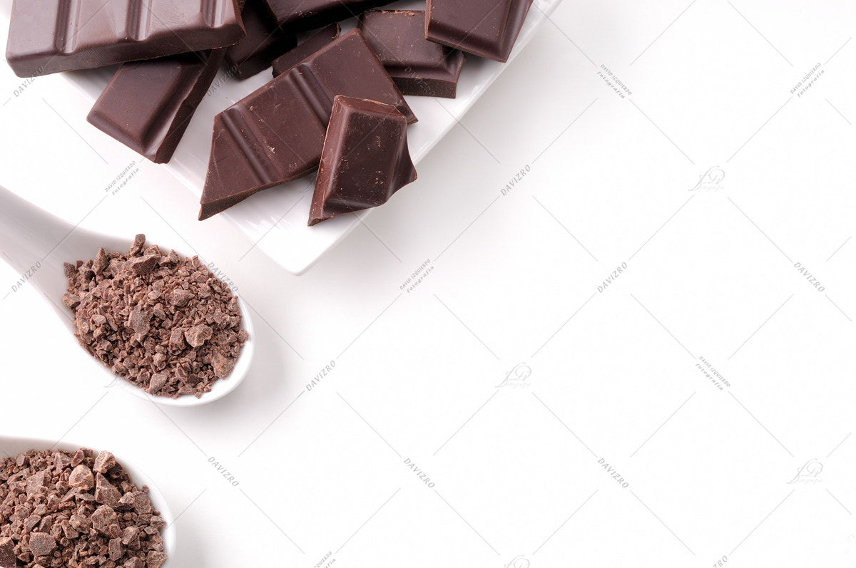 Tamron SP 24-70mm F2.8 Di VC USD sample photo. Portions and chocolate chips on white container isolated top lef photography