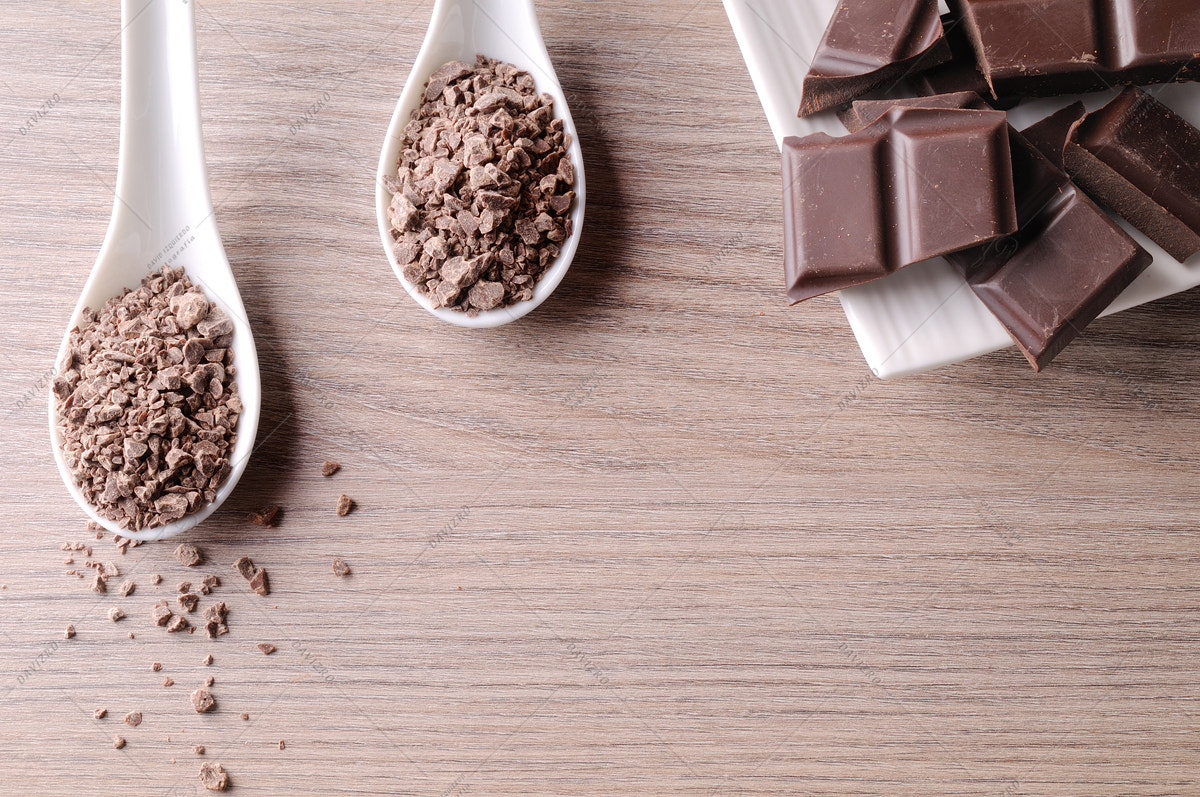 Tamron SP 24-70mm F2.8 Di VC USD sample photo. Portions and chocolate chips on white container on wood top photography
