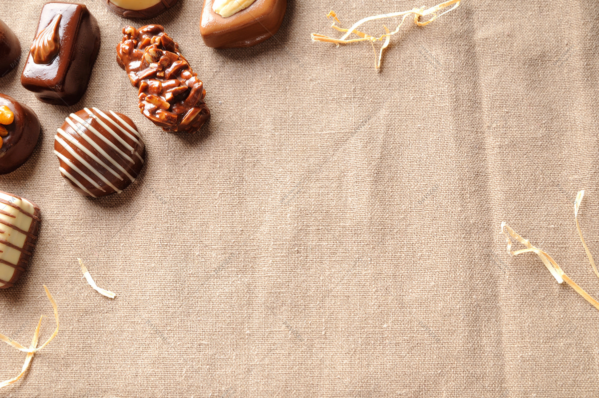 Tamron SP 24-70mm F2.8 Di VC USD sample photo. Assorted bonbons on tablecloth fabric with straw decoration top photography
