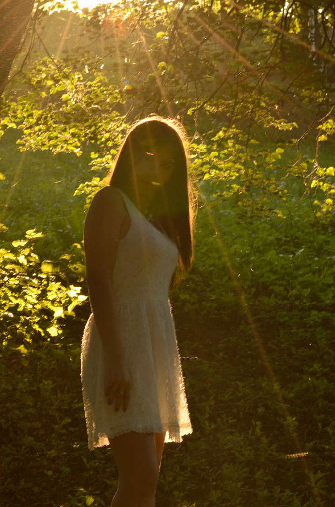 Nikon D5100 sample photo. The effect of summer light on young woman photography