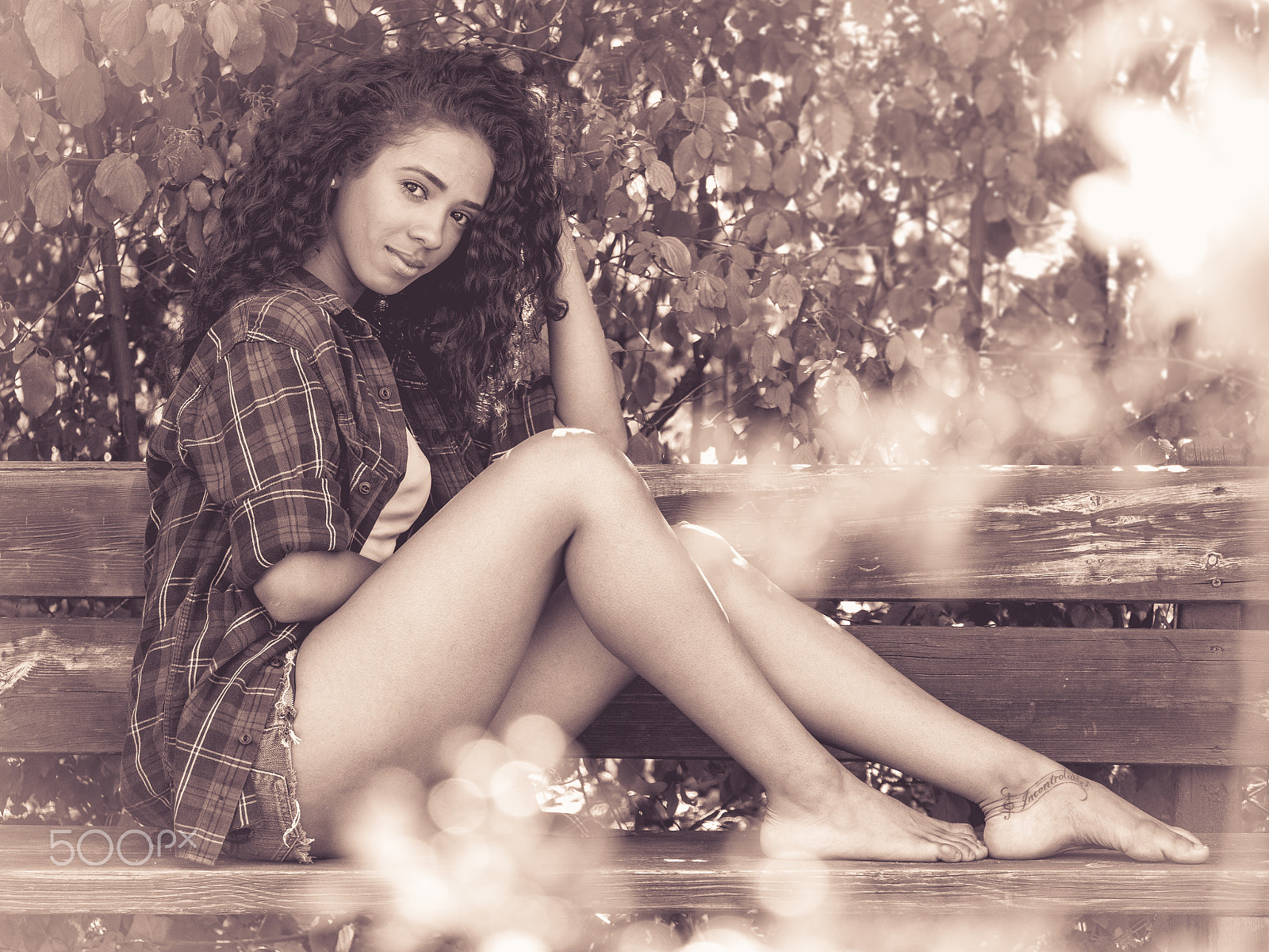 Panasonic Lumix DMC-GH3 sample photo. Monochrome beautiful hispanic woman in a park photography