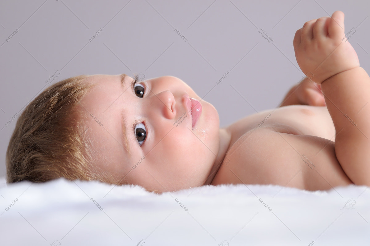Tamron SP 24-70mm F2.8 Di VC USD sample photo. Baby lying on blanket of white hair photography