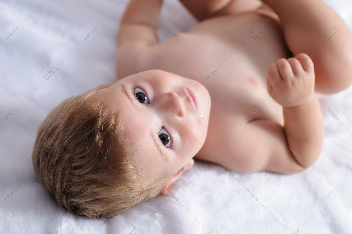 Tamron SP 24-70mm F2.8 Di VC USD sample photo. Blonde baby lying on blanket with white hair photography