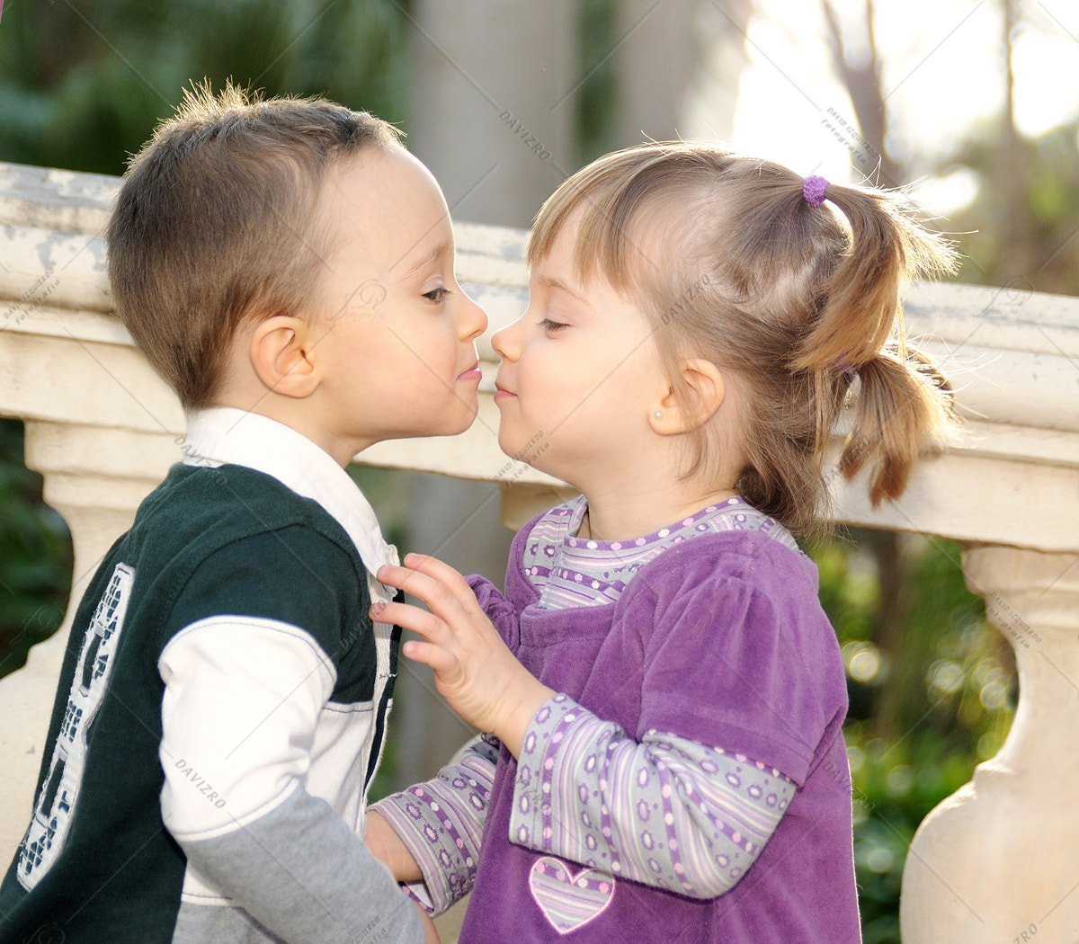Tamron SP 24-70mm F2.8 Di VC USD sample photo. Girl and boy kissing tenderly in the park photography