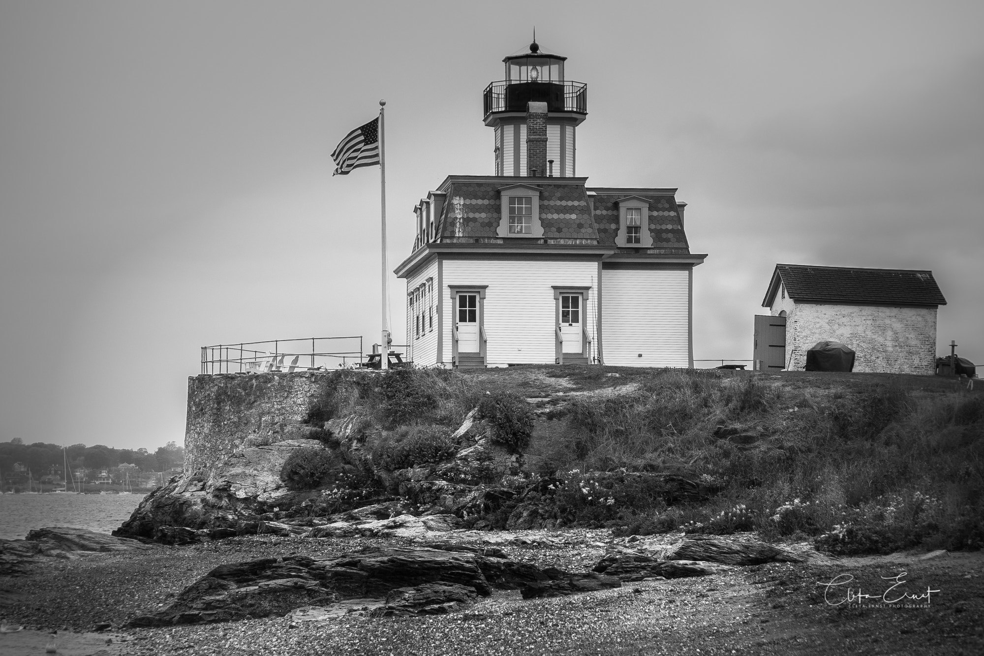 Sony E 55-210mm F4.5-6.3 OSS sample photo. Rose island lighthouse in b&w photography