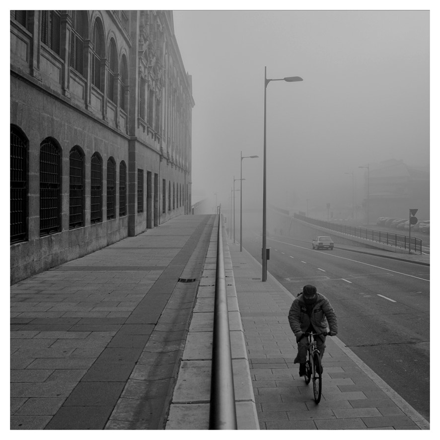 Nikon D700 + Sigma 28-200mm F3.5-5.6 Compact Aspherical Hyperzoom Macro sample photo. Bicycle in the fog photography