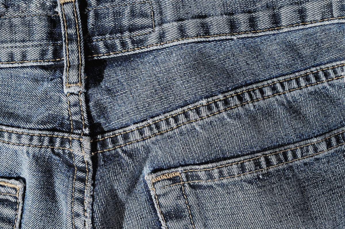 Nikon D300 sample photo. Back of blue jeans texture photography