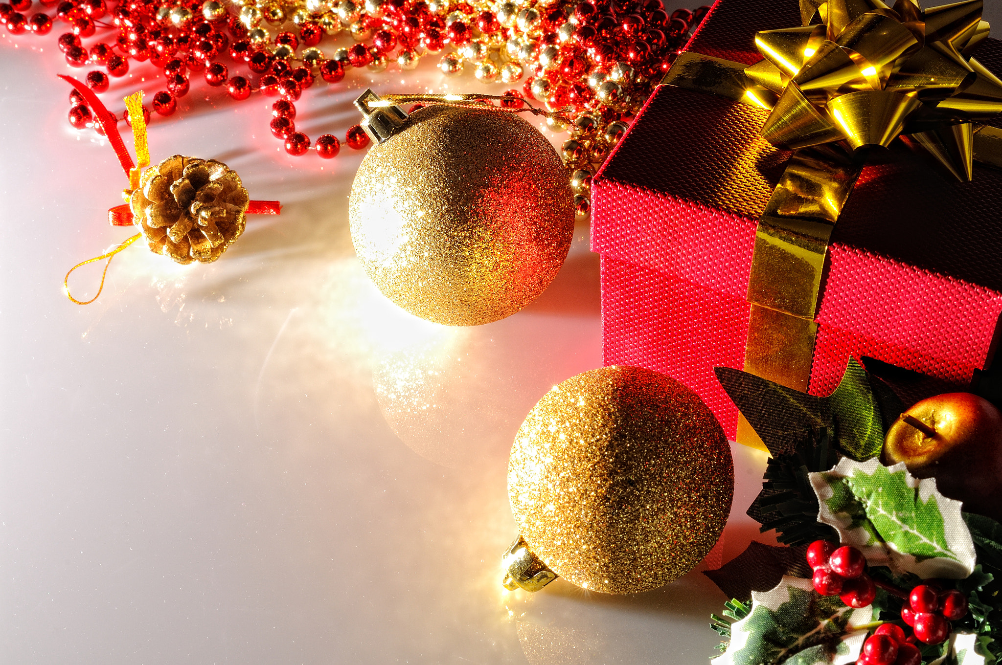 Nikon D300 sample photo. Gloom christmas decoration with two balls and gift top view photography