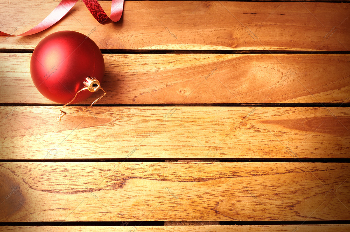 Tamron SP 24-70mm F2.8 Di VC USD sample photo. Red ball and ribbon christmas decoration on wooden table top photography