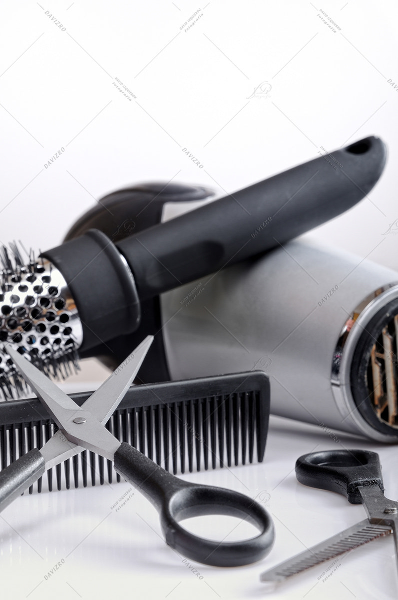 Tamron SP 24-70mm F2.8 Di VC USD sample photo. Closeup hairdressing tools on a white table photography