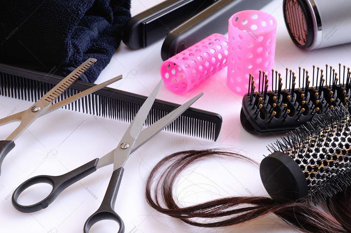 Tamron SP 24-70mm F2.8 Di VC USD sample photo. Set hairdressing articles exposed on a white table photography