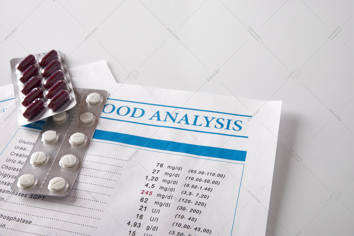 Blood analysis report with drug blisters elevated view