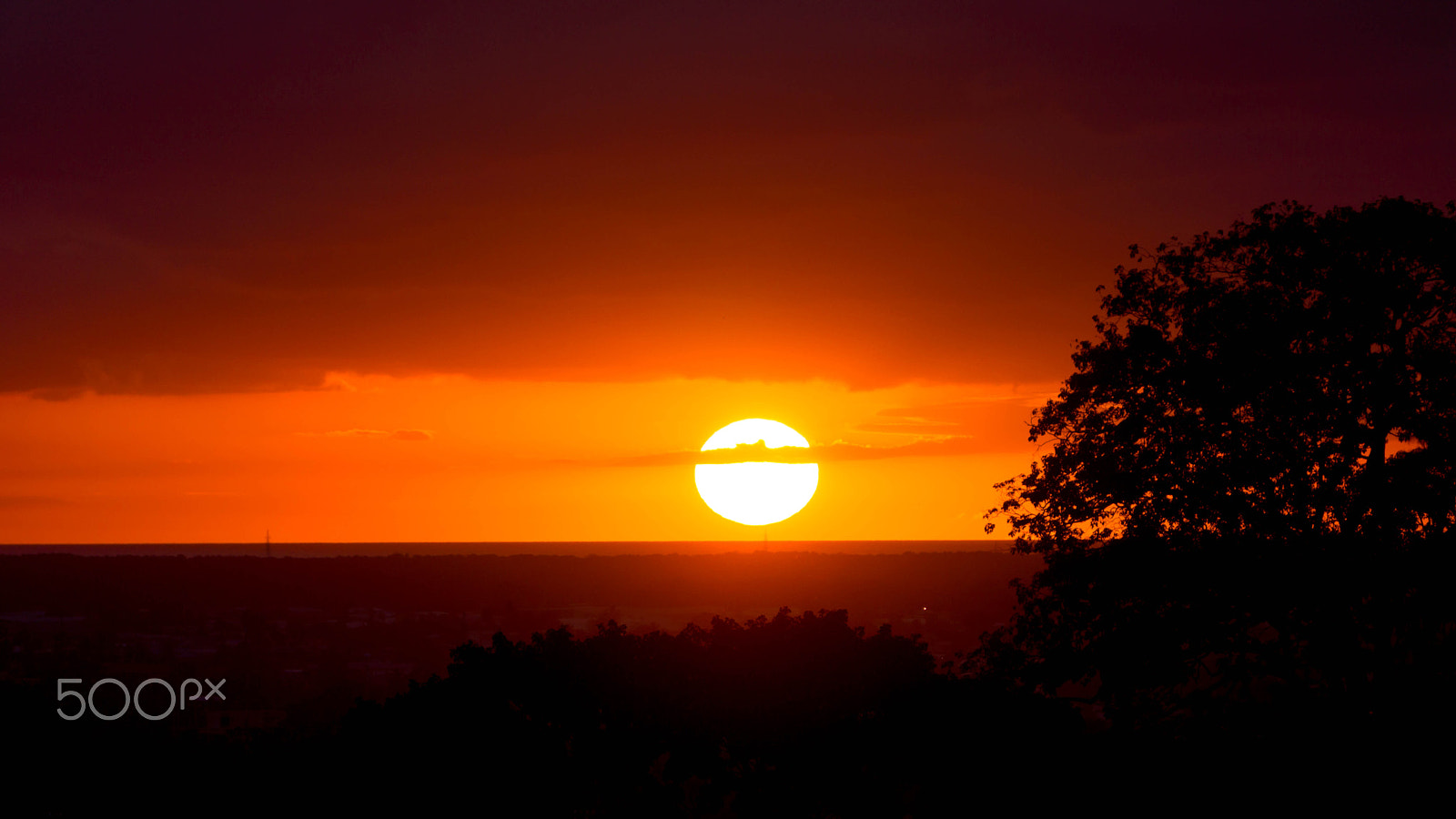 Sony Alpha NEX-7 + Sony E 55-210mm F4.5-6.3 OSS sample photo. Trinidad sun set photography