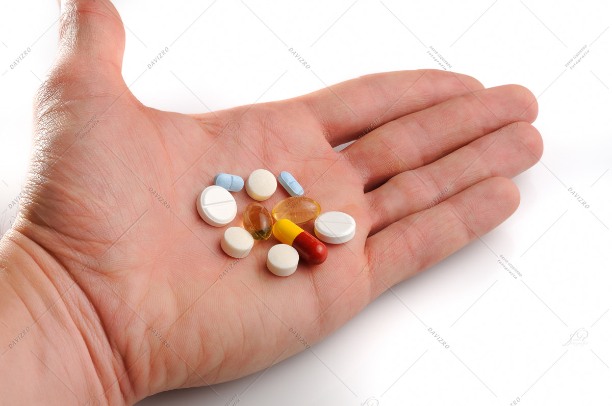 Nikon D300 sample photo. Offered pills on hand photography